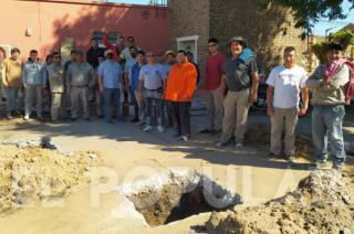 Los trabajadores de la obra que realizaron el paro